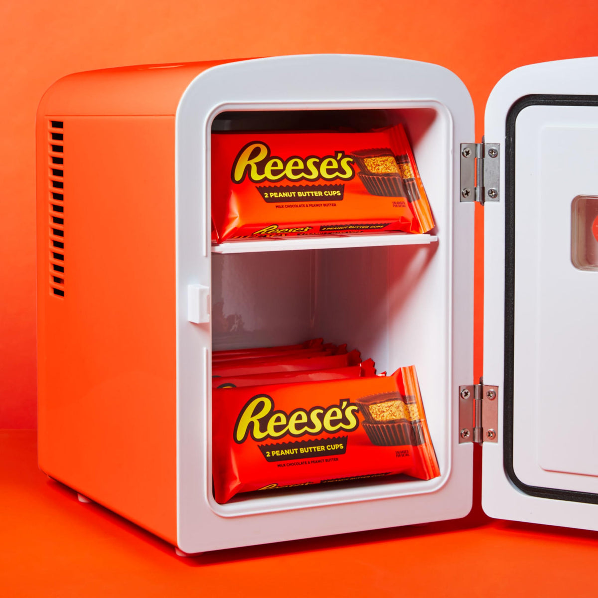 Bulk display of REESE'S cups on store shelf