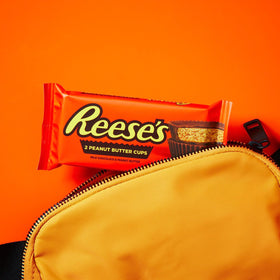 Party table setup featuring REESE'S cups as a sweet treat
