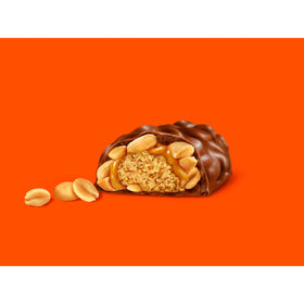 Seasonal display of REESE'S NUTRAGEOUS bars for holidays.