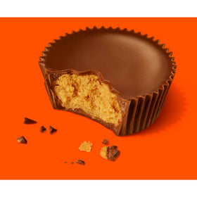 Reese's Peanut Butter Big Cup cross-section reveals chocolate shell and filling.