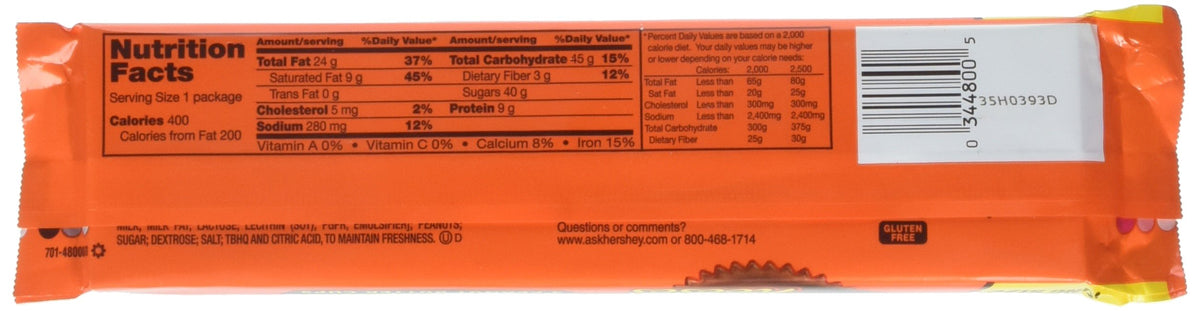 Reese's King Size cup close-up, creamy peanut butter center for satisfying snacking.