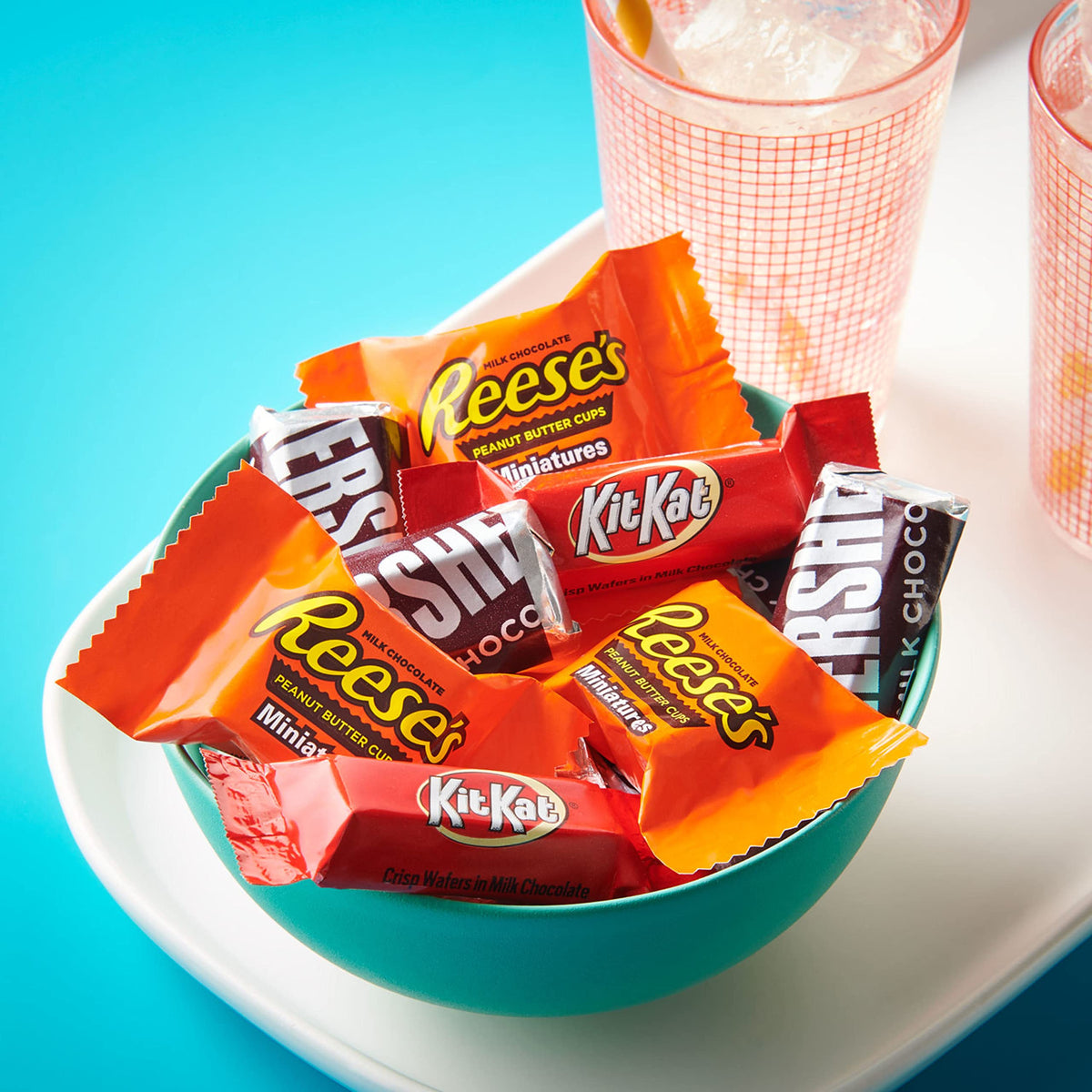 Reese's peanut butter cups and Kit Kat wafers highlighted for snacking.