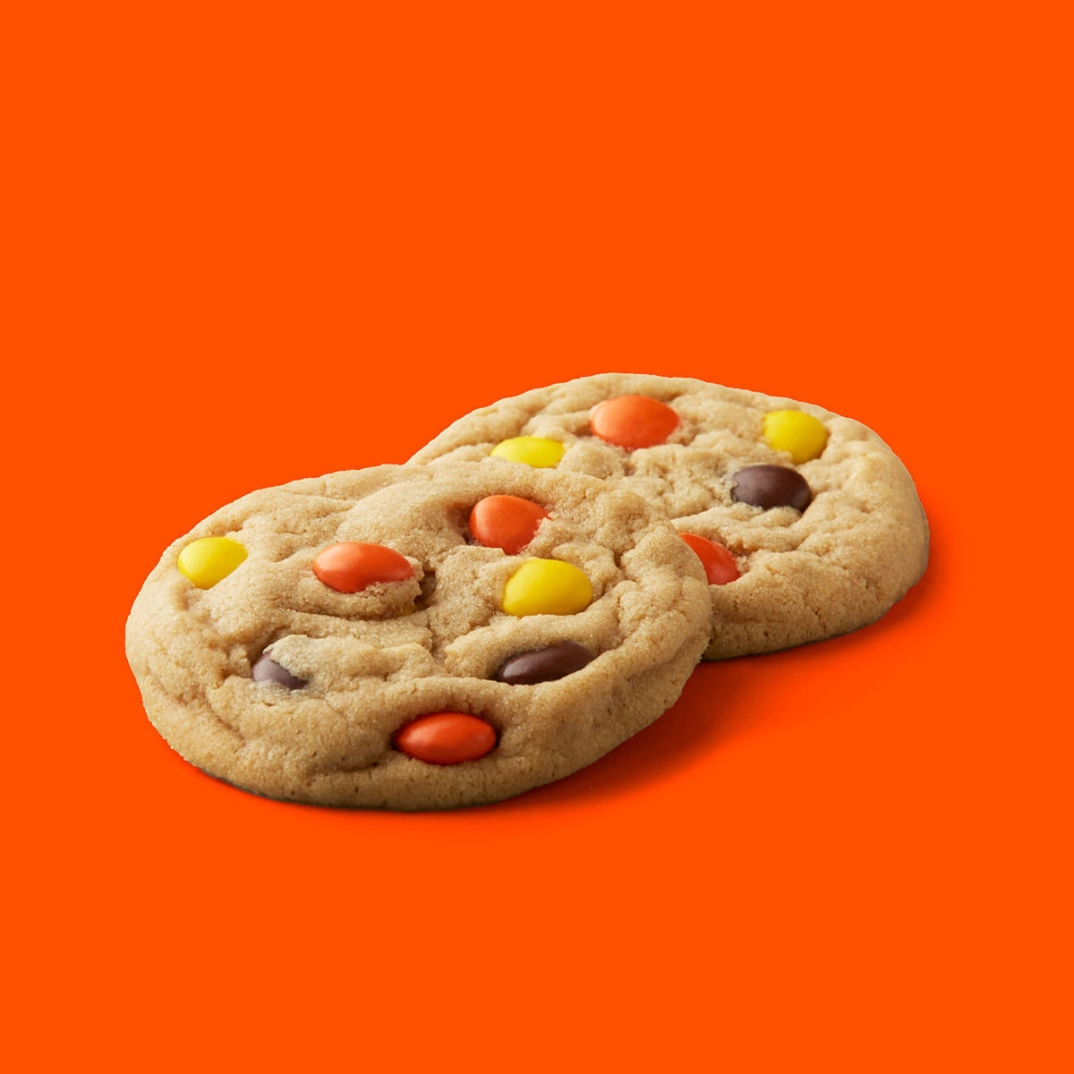 Close-up of Reese's Pieces crunchy shells highlighting texture and flavor.