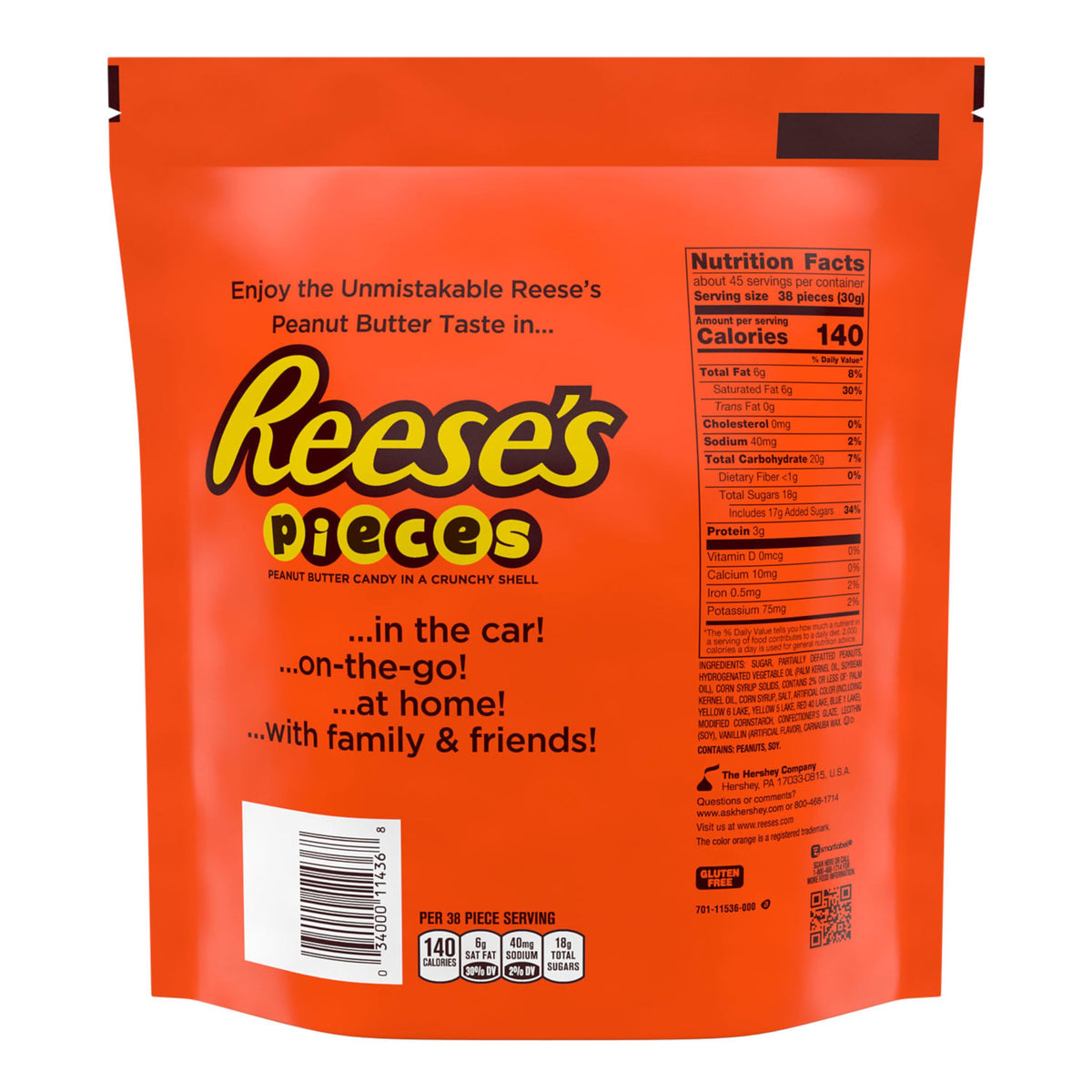 Reese's Pieces being poured, a crunchy, convenient snack great for gatherings.