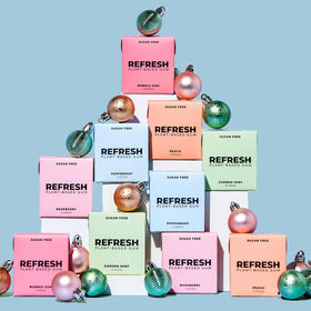 Refresh Gum non-GMO gluten-free and vegan certification icons