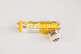 Regal Crown sour lemon hard candy rolls, closeup showing sugar coating and tangy layers.
