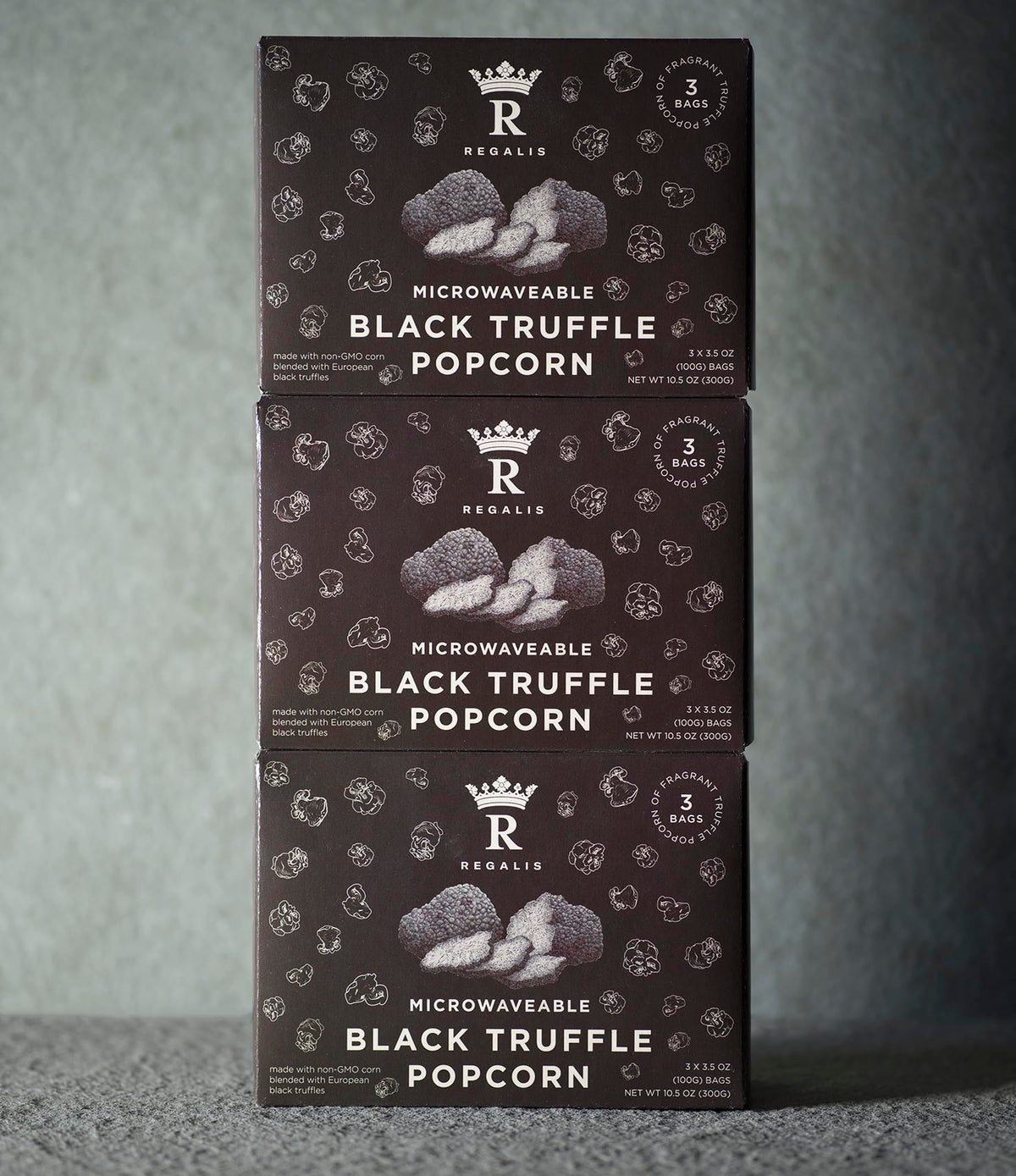 Regalis microwavable black truffle popcorn elegant-packaging hints at luxury snack.