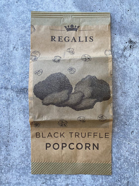 Regalis microwavable black truffle popcorn fresh aroma captures premium scent in dining room.