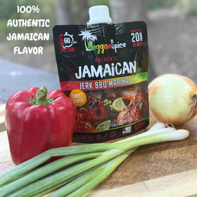 Reggae Spice grilling meat with jerk glaze searing on a grill