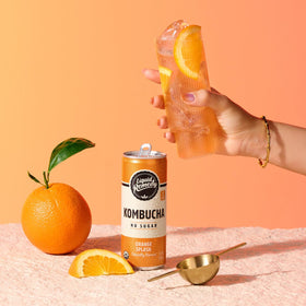 Remedy Orange Splash bottle chilling in fridge signals quick, low-calorie pick-me-up.