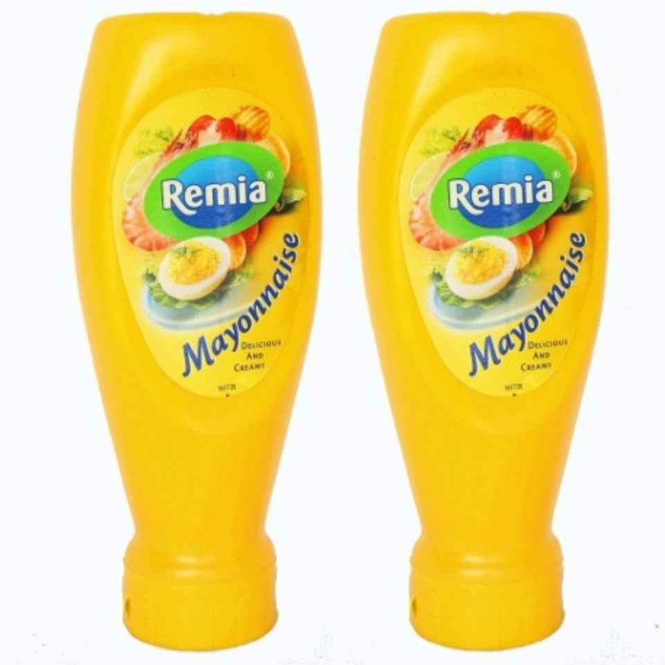 Remia mayonnaise two-pack bottles on kitchen counter for sandwiches and salads.