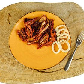 Renna sun-dried tomatoes in oil bottle; easy to pour for quick meals.
