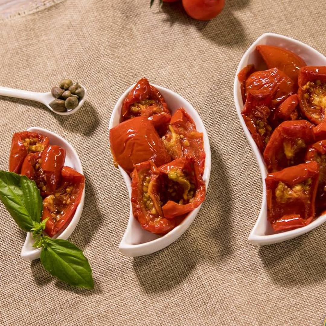 Renna sun-dried tomatoes in oil on couscous salad; adds depth.