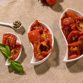 Renna sun-dried tomatoes in oil on couscous salad; adds depth.