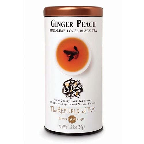 The Republic of Tea Ginger Peach Black Full-Leaf Tea tin front shows vibrant flavor and energy lift.