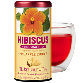 The Republic of Tea Pineapple Lychee Hibiscus tea in a cup with tropical notes.
