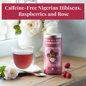 The Republic of Tea Raspberry Rose Hibiscus tea bag closeup shows vibrant fruit aroma.