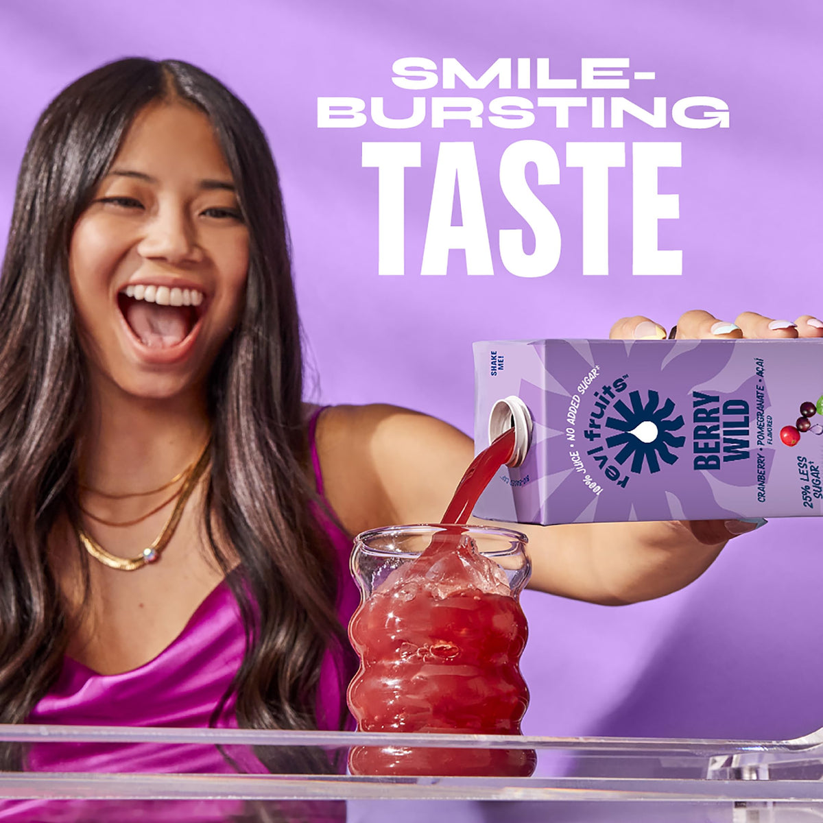 REVL FRUITS Berry Wild pour into glass, refreshing color