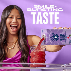 REVL FRUITS Berry Wild pour into glass, refreshing color