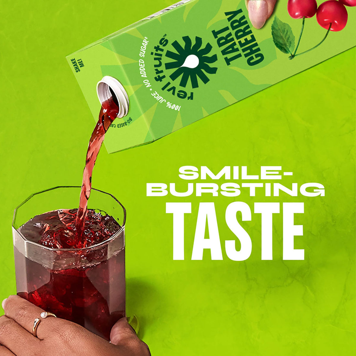 REVL FRUITS Tart Cherry juice label close-up highlighting 100% juice with coconut water.