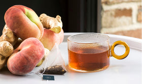 Revolution Tea Sweet Ginger Peach Black Tea loose-leaf presentation highlights vibrant aroma and flavor.