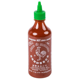 Rex Sriracha dipping sauce on plate enhances snacks and starters.