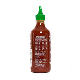 Rex Sriracha in wok during stir-fry for vibrant heat.