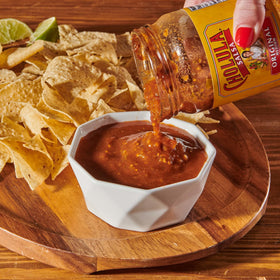 Rice and beans elevated by Cholula Original Salsa