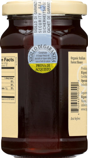 Rigoni di Asiago forest honey jar on wooden table