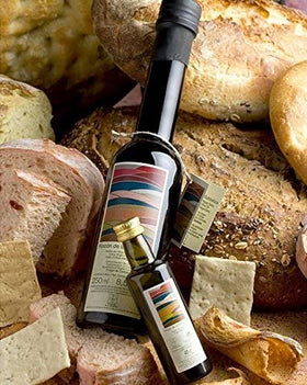 Rincon de la Subbetica olive oil on salad, enhancing fresh flavors with a silky finish.
