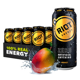 RIOT Mango energy drink can on desk boosts focus for study or work.