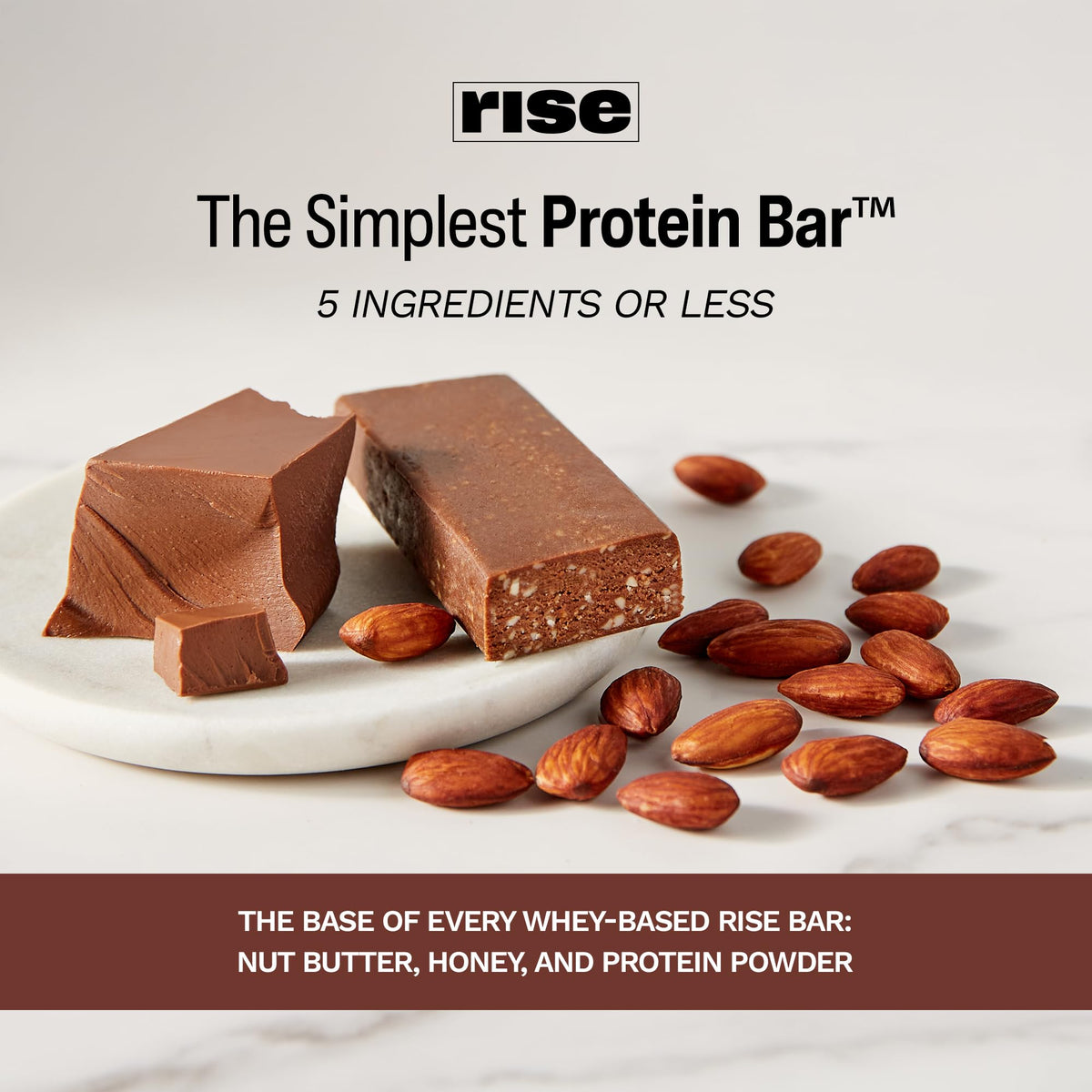 Small-batch handmade Rise bar displayed on a wooden board.