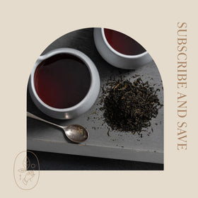 Rishi tea setup with cup and saucer, inviting afternoon moment.