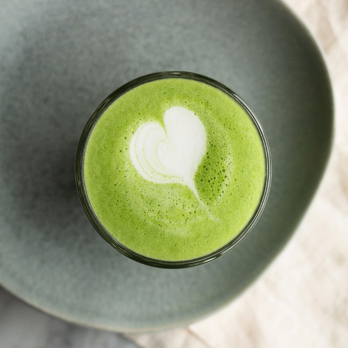 Rishi Everyday Matcha cup-foam illustrating creamy latte-style texture.