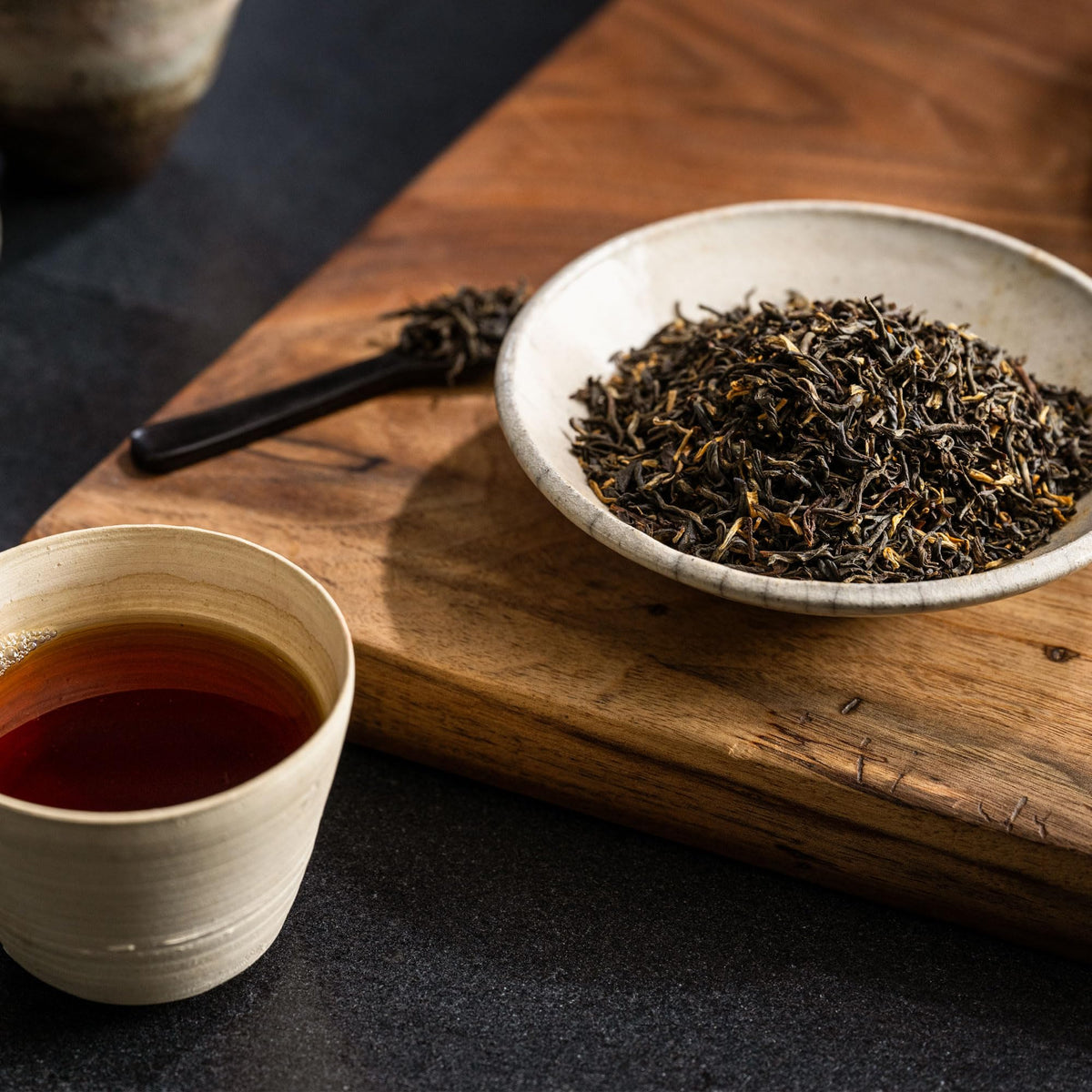 Rishi Tea logo on Golden Yunnan packaging.