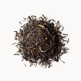 Rishi Golden Yunnan cup showing rich amber infusion and aroma.