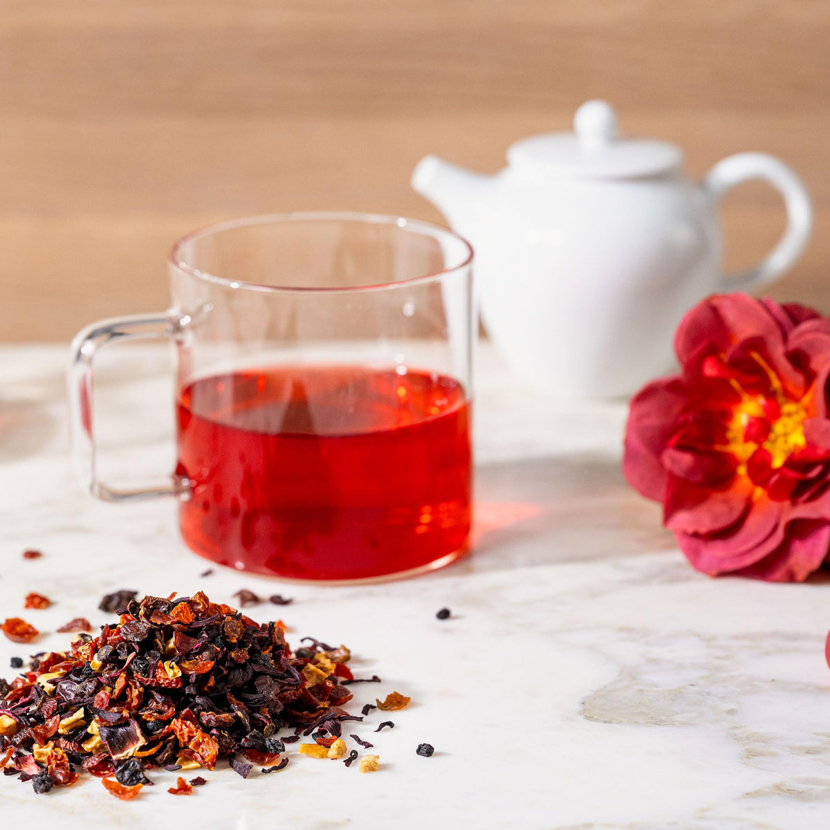 Rishi Tea Hibiscus Berry brand ethics symbol indicates organic, kosher, and non-GMO quality