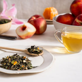 Rishi Peach Blossom iced serving glass showcases fruit-forward, refreshing flavor.