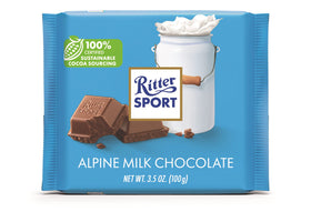 Ritter Sport Alpine Milk Chocolate bar front pack on shelf, showcasing a 12-bar set and sustainable sourcing.