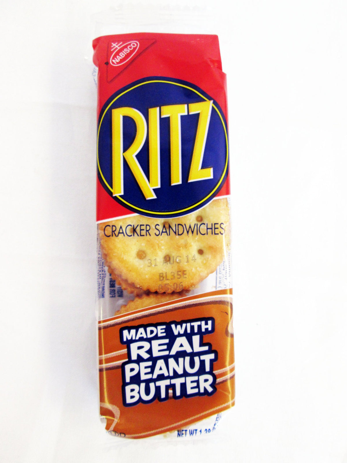 Ritz peanut butter cracker sandwich cross-section highlights creamy filling between crisp crackers.