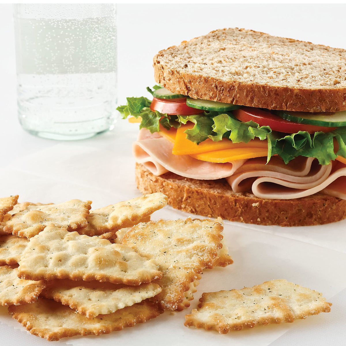 RITZ Toasted Chips Sour Cream and Onion bulk pack on a table.