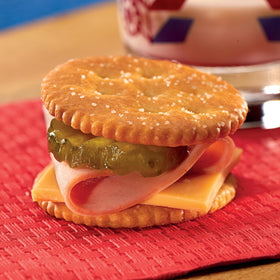 Ritz Whole Wheat Crackers served with cheese and fruit for snacks