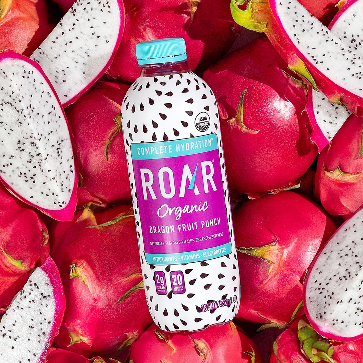 ROAR Complete Hydration Organic glass with dragonfruit-punch showcases serving idea
