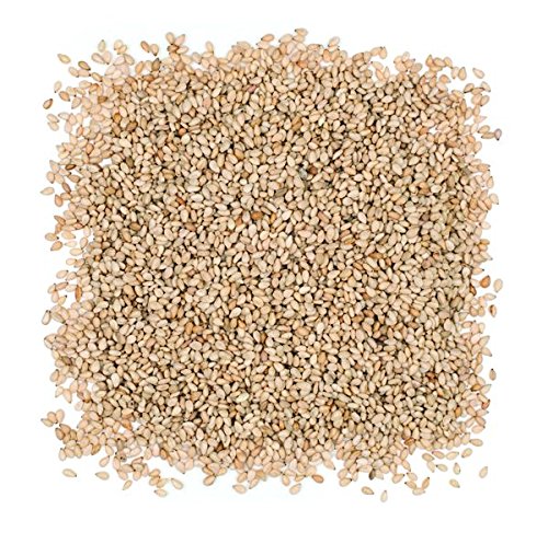 Roland Foods sesame seeds sprinkled over a dish, versatile topping for salads and more