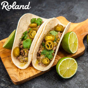 Roland Foods jalapeno slices on tacos for tangy spice
