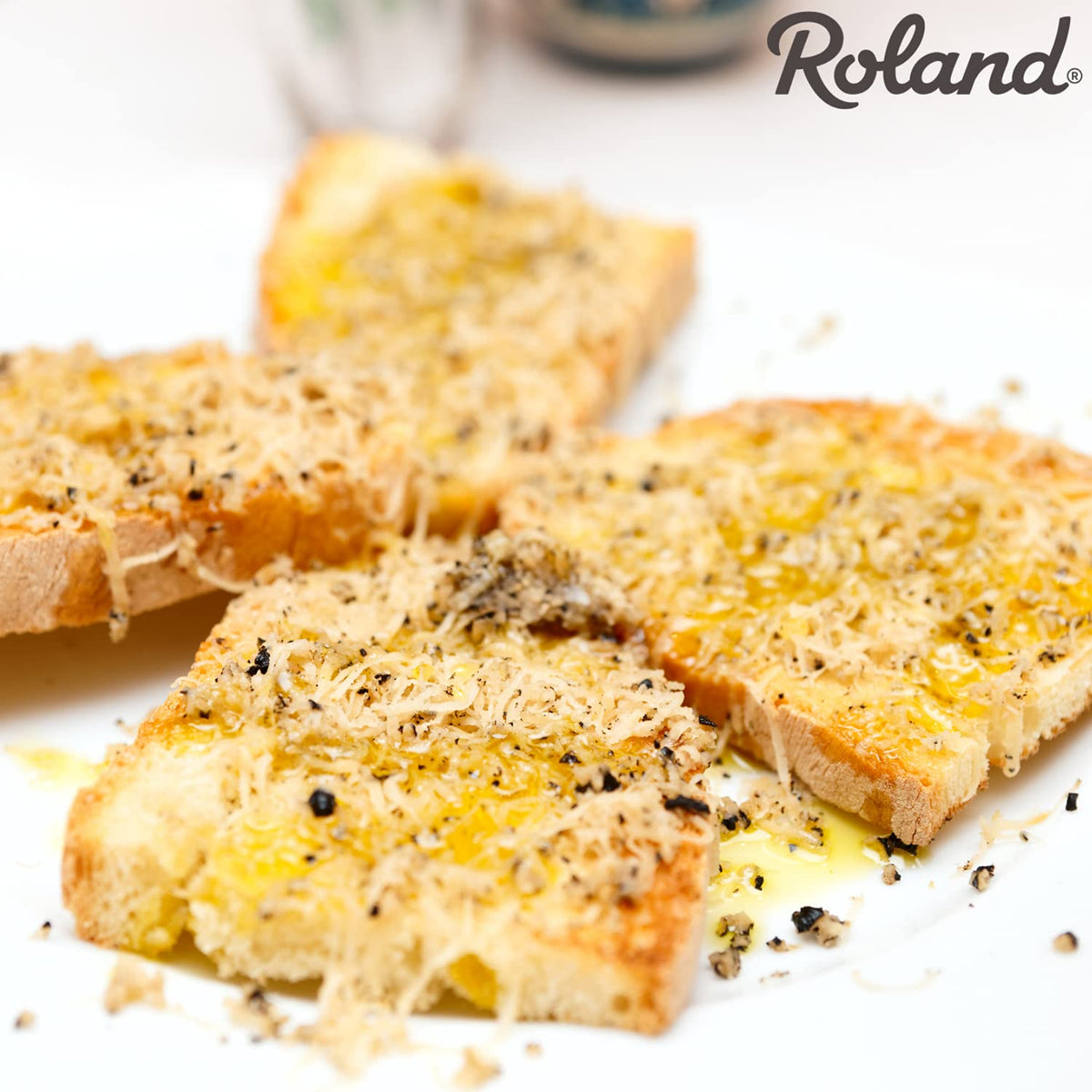 Roland Foods Black Truffle Oil finishes eggs with fragrant savor.