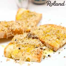Roland Foods Black Truffle Oil finishes eggs with fragrant savor.