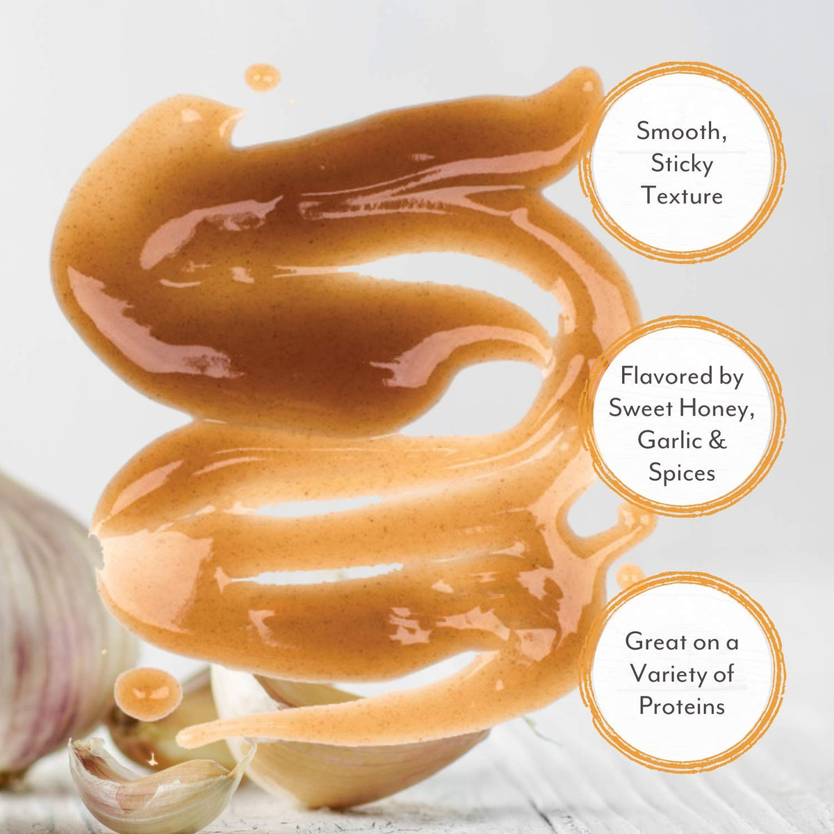 Roland Foods Honey Garlic Sauce dipping spring rolls with bold sweet heat.
