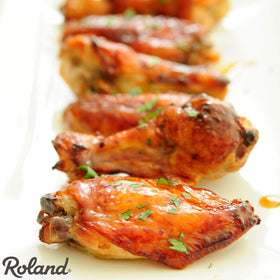 Roland Foods Honey Garlic Sauce serving tray setup for family meals.