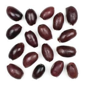 Roland Foods Kalamata olives served on a board for salads and tapas.